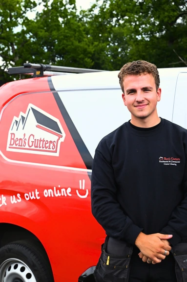 our gutter cleaner in Exeter standing by company vehicle